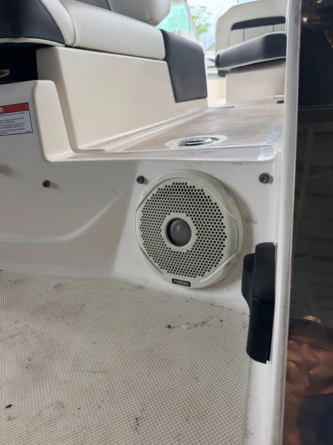 Marine amplifier and blue LED speaker installed during a sound system upgrade