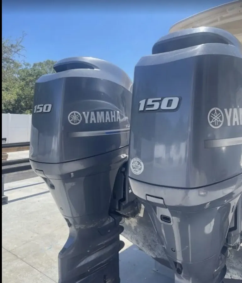 Twin 150 outboards on a boat ready for service