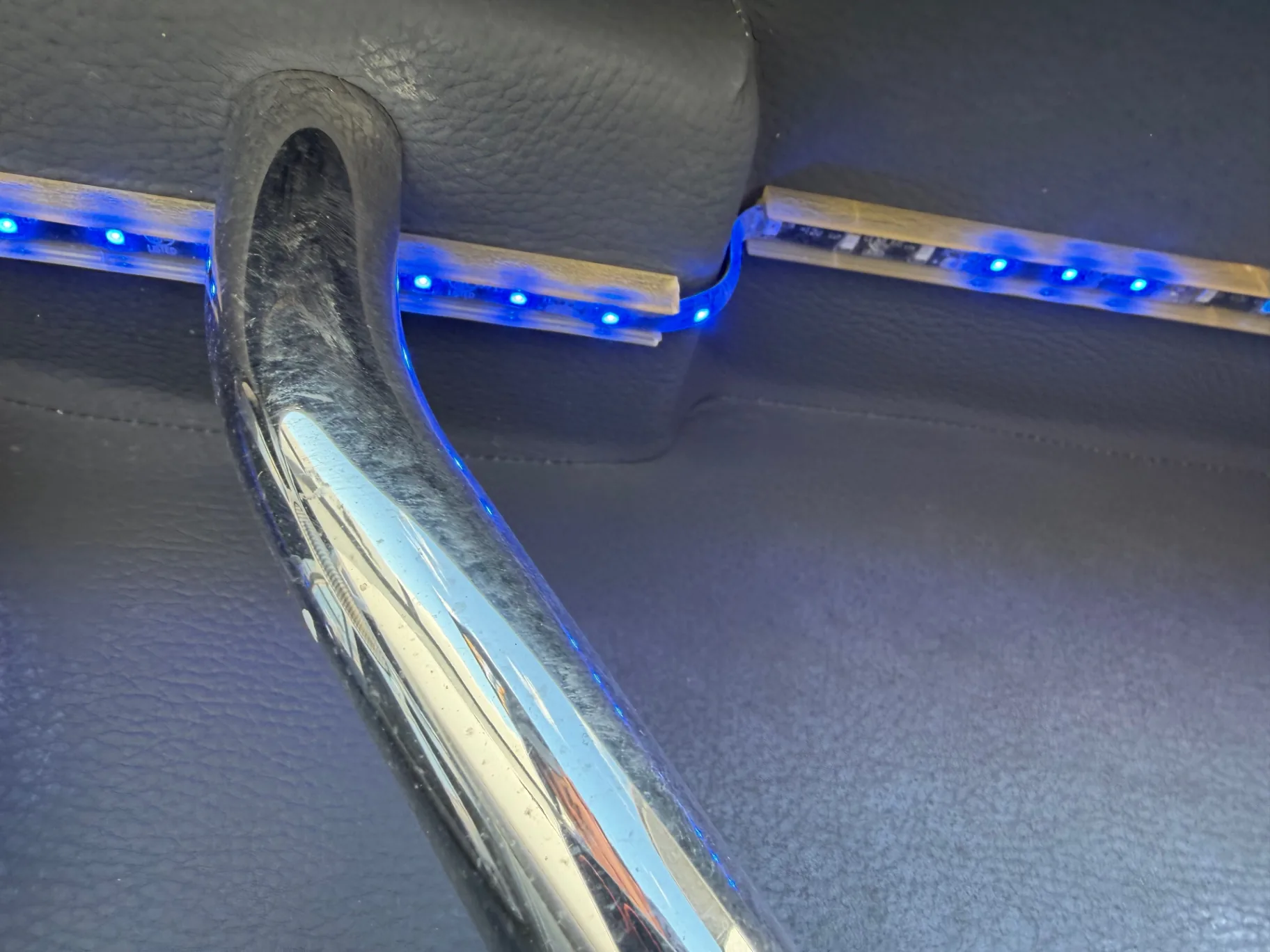Blue LED courtesy lighting installed under a boat's gunwale
