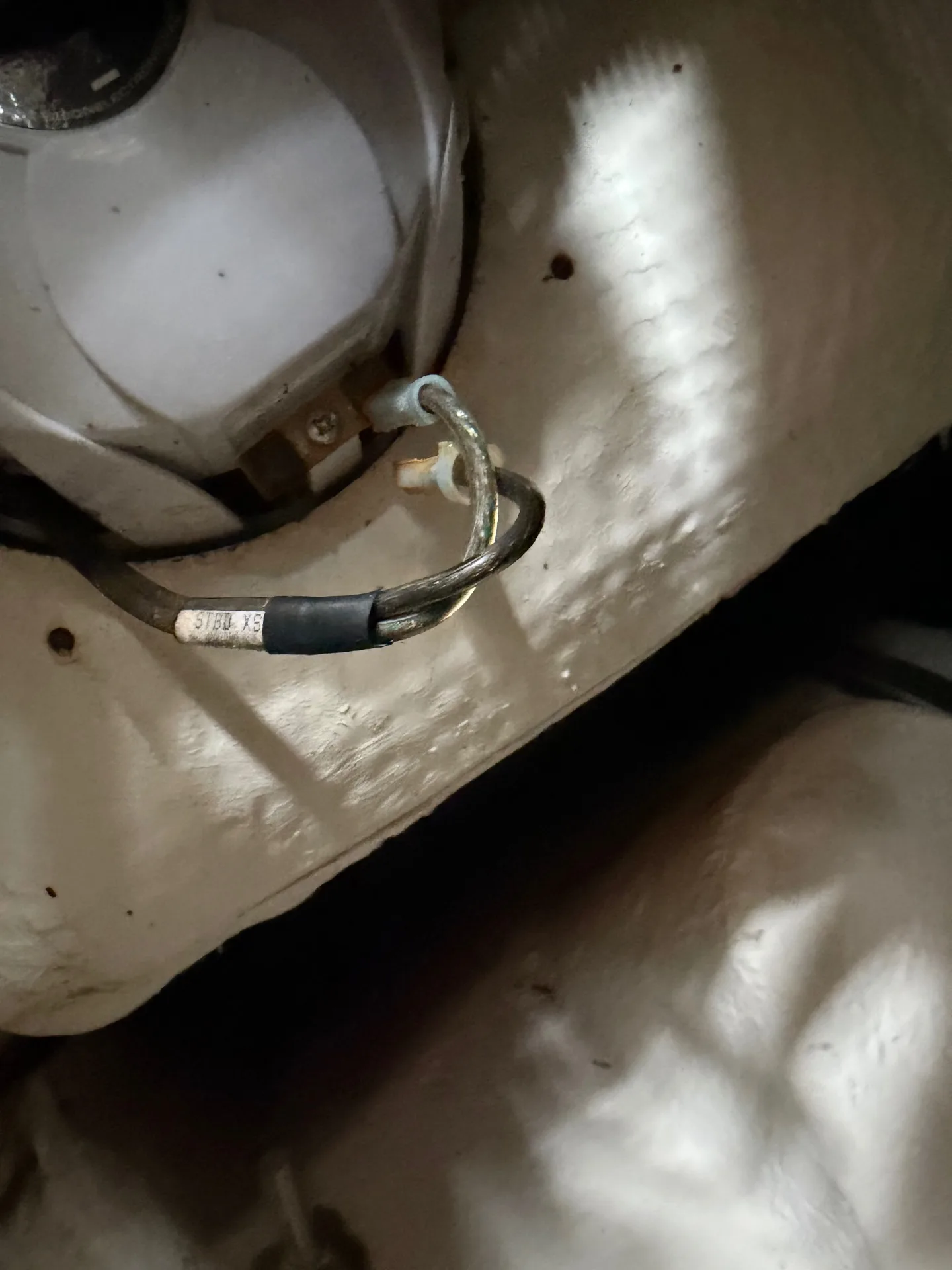 New shore power inlet installed on a boat during an electrical upgrade