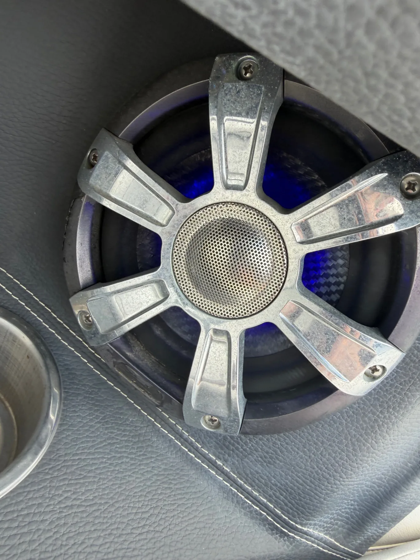 Marine speaker with blue LED lighting installed during an electronics job